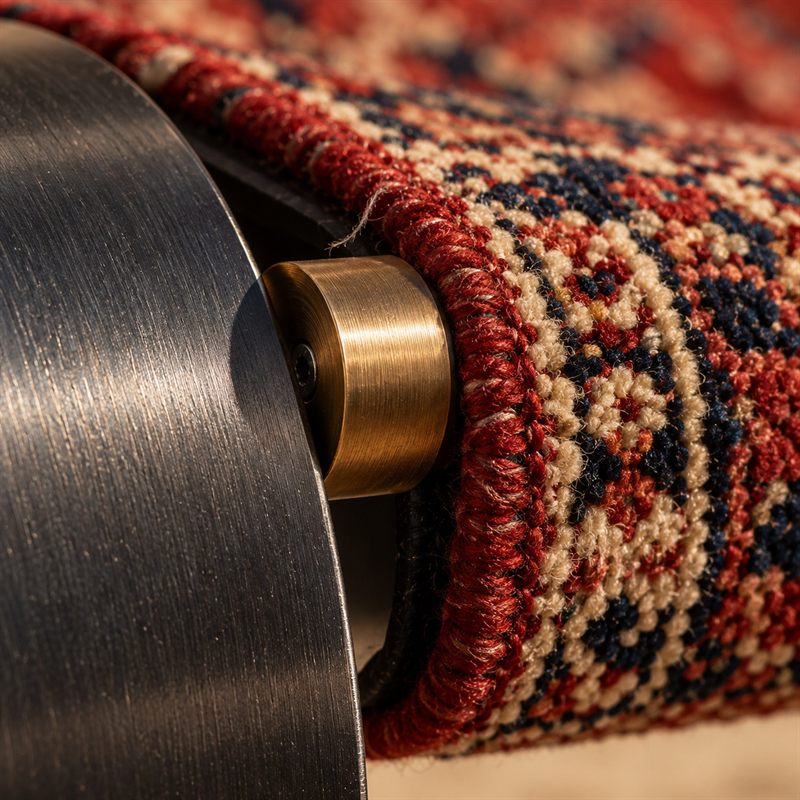 Detail of Taar No. 1: a bronze fitting joining the hand-knotted textile to the steel frame